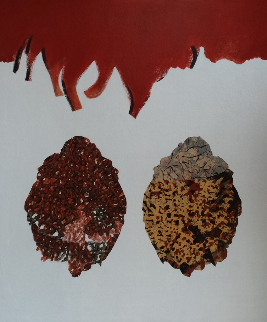 Twee bolle vormen onder rode hemel