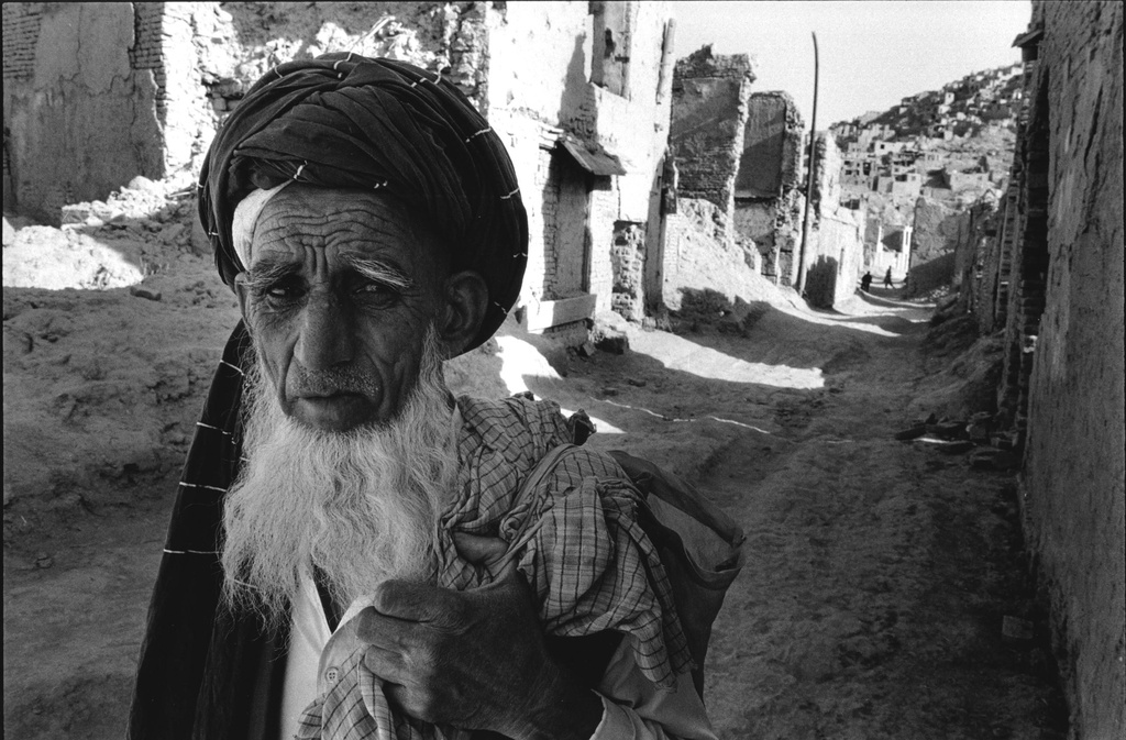 Old man in his destroyed neighborhood, Kabul, Afghanistan, 1996