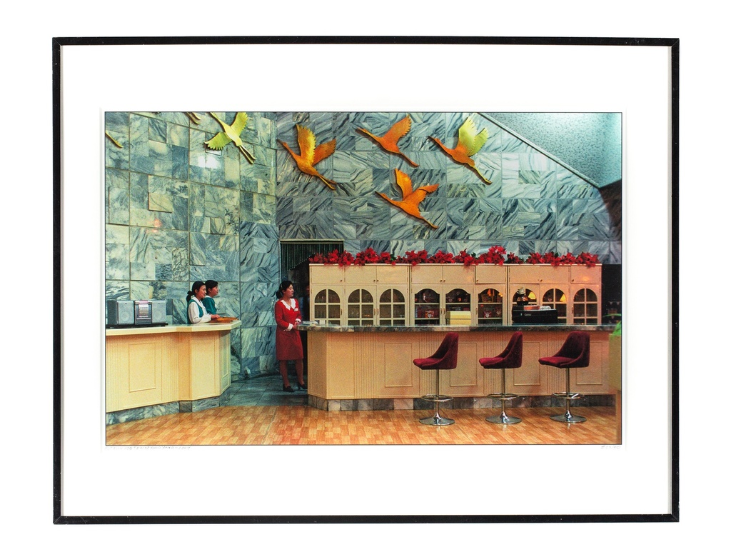 Hotel Bar Pyongyang 2004. Three waitresses in Hotelbar wait for customers